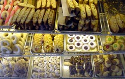 Stella Pastry has many cookie shapes, including swirls, rings and candy canes. Some cookies are dipped in chocolate or topped with fruit.