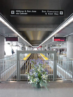 A bouquet of flowers was placed in front of the tracks to celebrate the opening of the BART Station.
